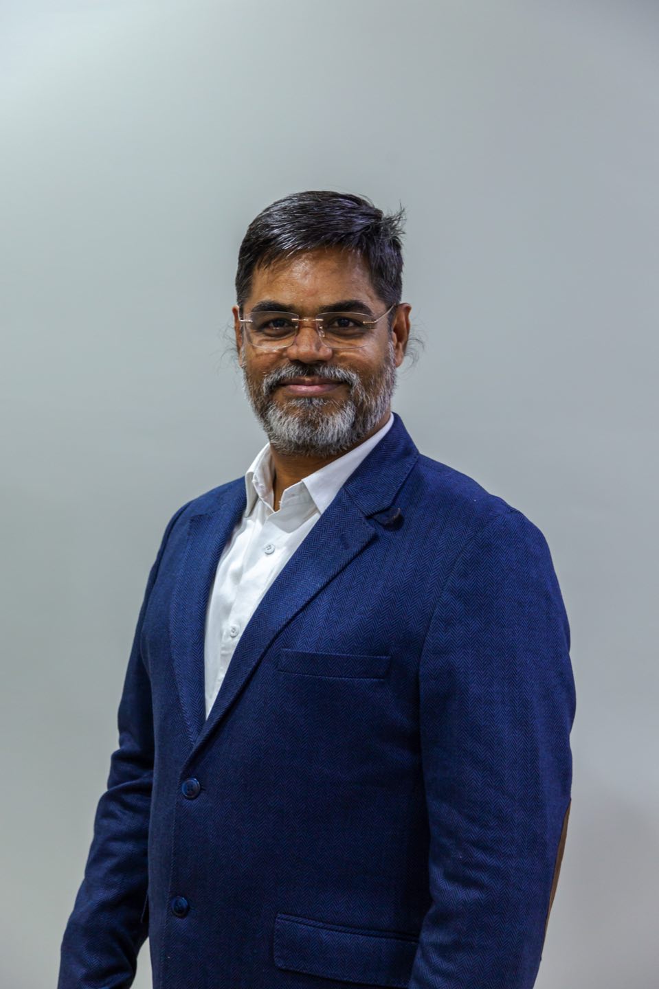 Portrait of Mr. Sushil Gupta, Chief Marketing Officer at Pegma Resources